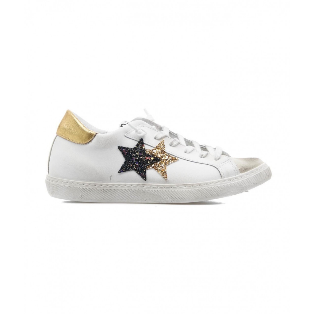 Sneakers con logo a stella bianco