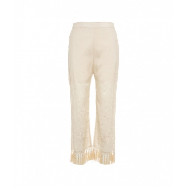 Pantaloni ricamati con bordi a frange crema